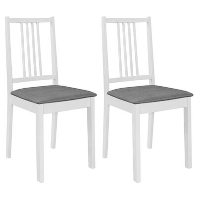 vidaXL Valgomojo kėdės su pagalv., 2 vnt., balt. sp., medienos masyvas