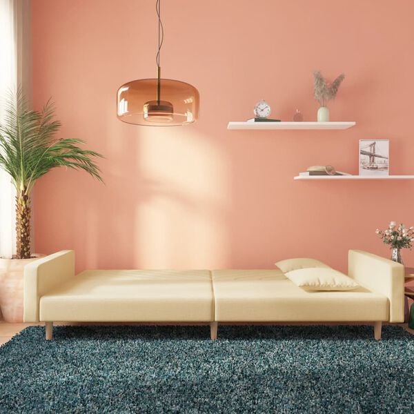 vidaXL Dvivietė sofa-lova su dvejomis pagalvėmis, kreminė, audinys